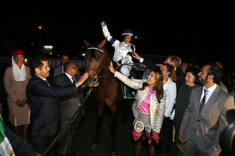 Oman's Azher Al Wardi celebrates after winning the HH Sheikha Fatima Bint Mubarak Ladies World Championship IFAHR race in Toulouse in 2015 on Shen